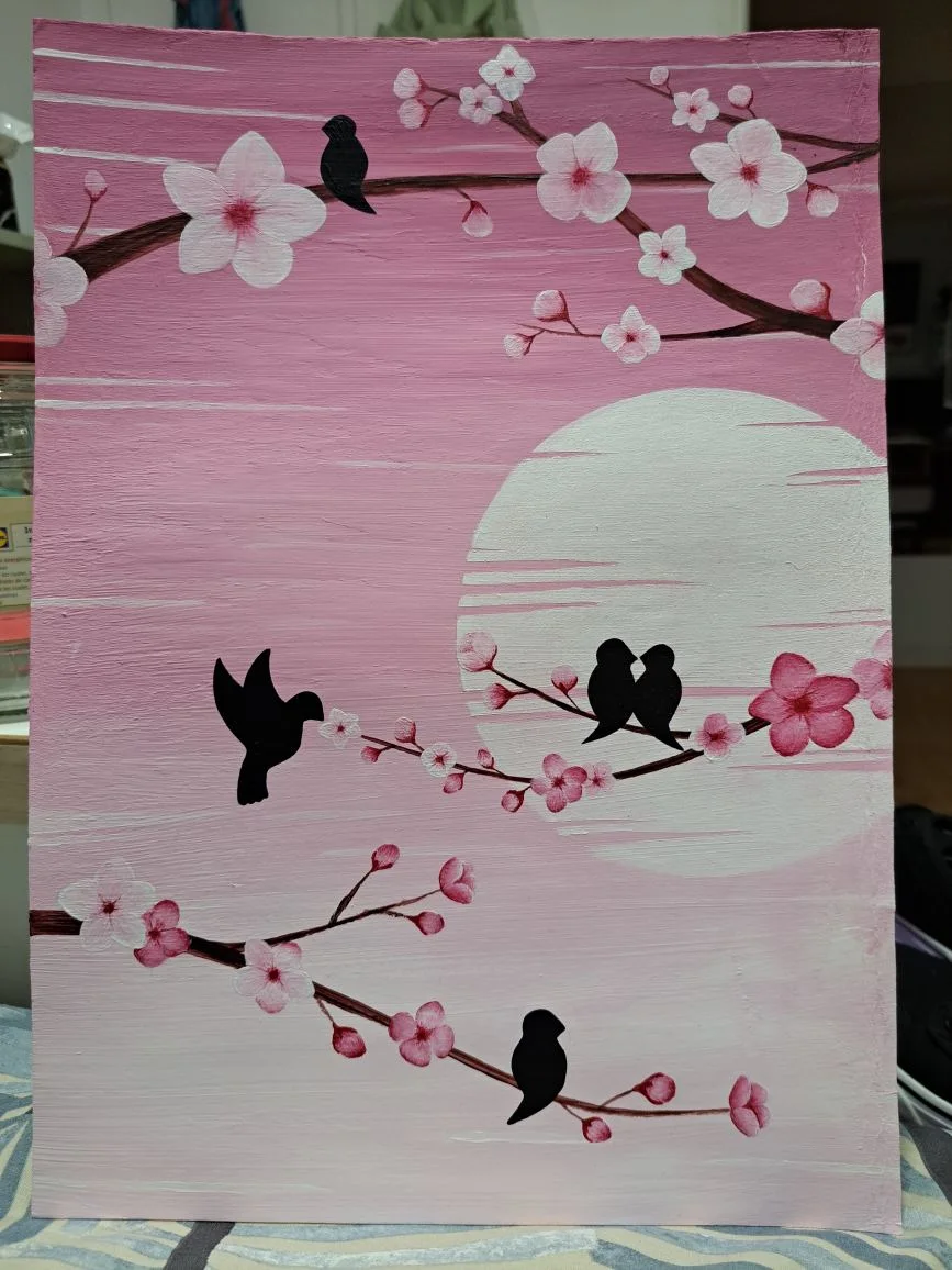 Pintura mural con flores de cerezo y pájaros